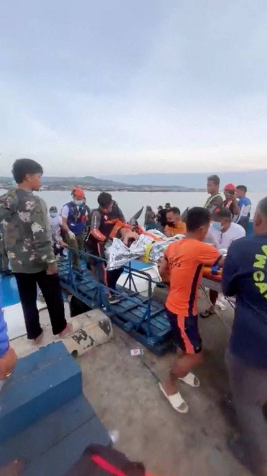 Emergency operations as victims of ferry capsize arrive in southern Philippines port