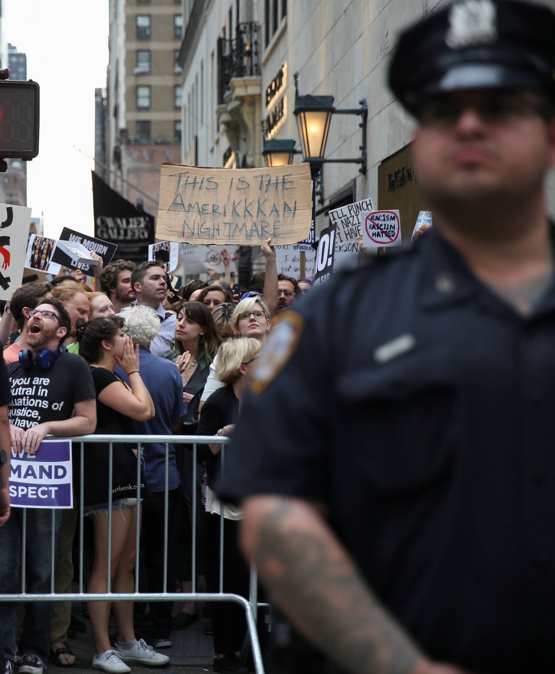 Police cordon off anti-Trump activists ahead of the arrival of U.S. President Donald Trump in Manhattan, New York