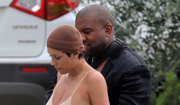 *PREMIUM-EXCLUSIVE* *MUST CALL FOR PRICING* Controversial rapper Kanye West is seen with his wife Bianca Censori who rocks a see-through outfit while out in Tuscany.