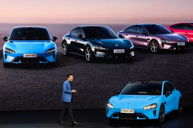 Chinese tech giant Xiaomi unveils new generation of SU7 electric vehicle, in Beijing