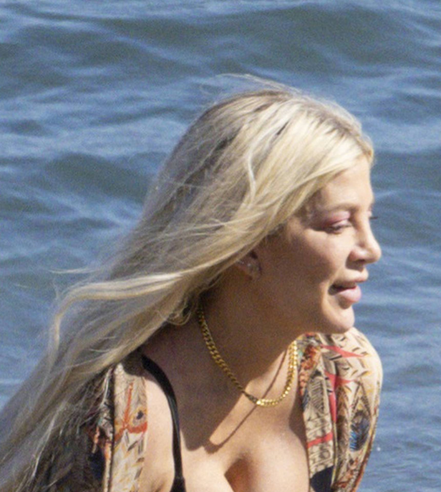 EXCLUSIVE: Mom To The Rescue ! Tori Spelling Jumps Into Action Quickly Saving Her Child After He Is Knocked Over By Strong Waves In The Malibu Surf