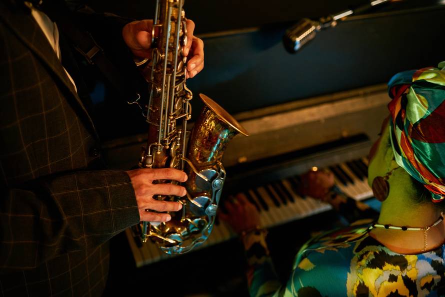 Cropped,Shot,Of,Multiracial,Musicians,Improvising,On,Saxophone,And,Piano