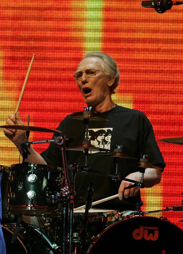FILE PHOTO: Drummer Ginger Baker performs as part of a Cream reunion concert at Madison Square Garden in New Yor..