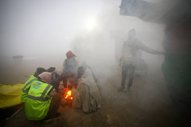 Devotees arrive ahead of Maha Kumbh Mela in Prayagraj