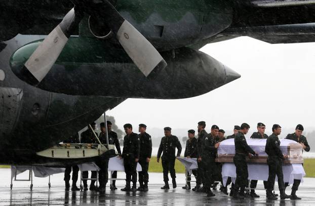 Coffins containing the mortal remains of the victims of the plane crash in Colombia arrive in Chapeco