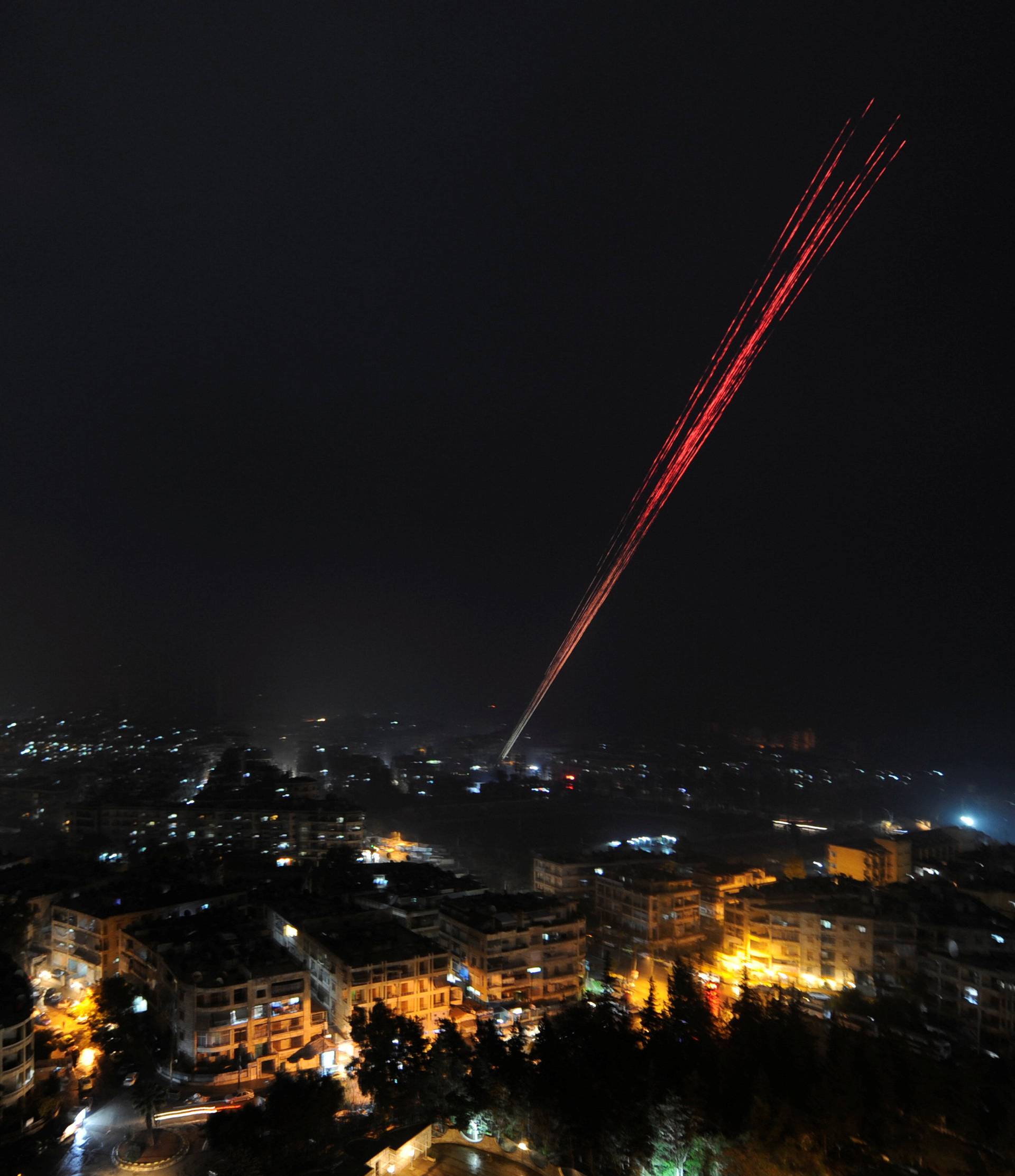 Govermental Syrian forces fires into sky as celebrating their victory against rebels in eastern Aleppo