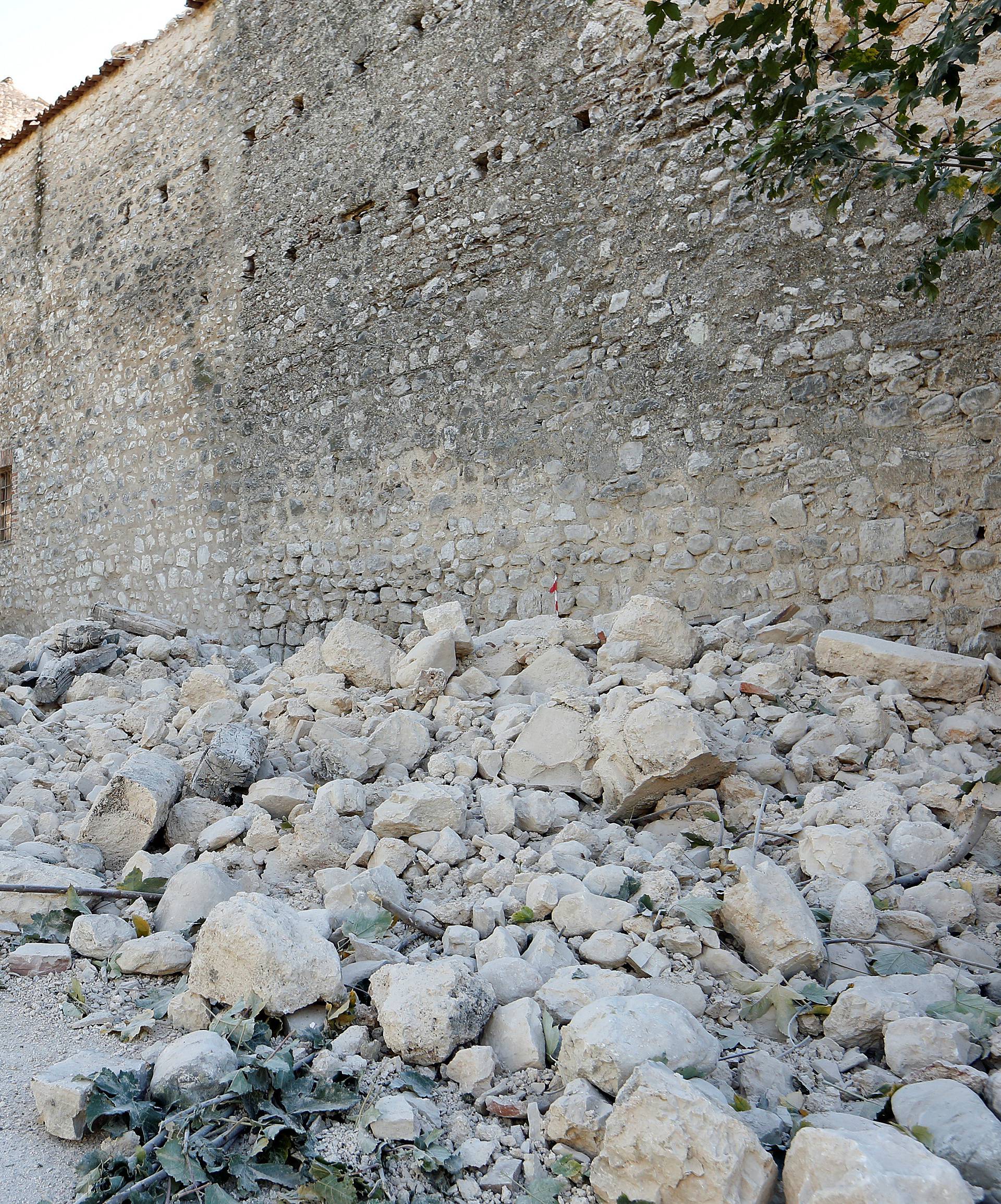 A partially collapsed wall  is seen following an earthquake in Norcia