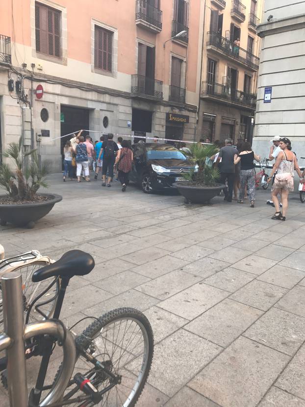 People pictured on Las Ramblas after a van crashed into crowds in Barcelona