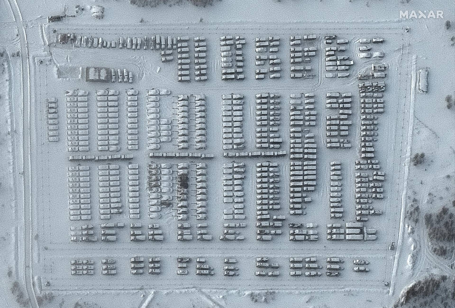 A satellite image shows the overview of a battle group vehicle park in Yelnya