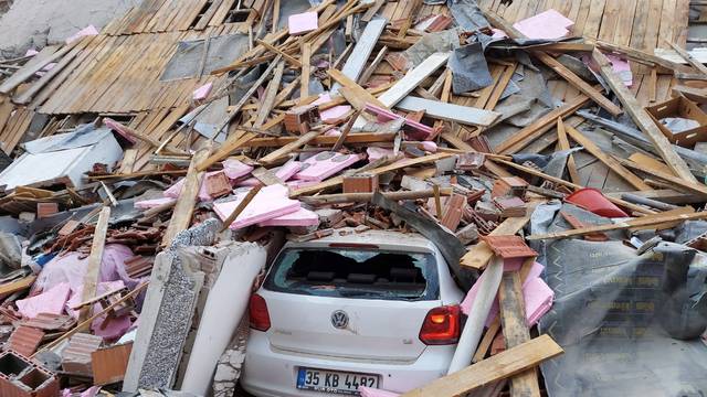 A building collapsed after a strong earthquake struck the Aegean Sea where some buildings collapsed in the coastal province of Izmir
