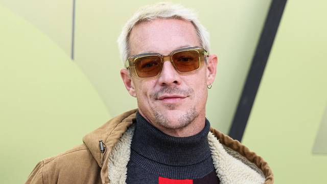 Diplo arrives at the Versace Fall/Winter 2023 Fashion Show