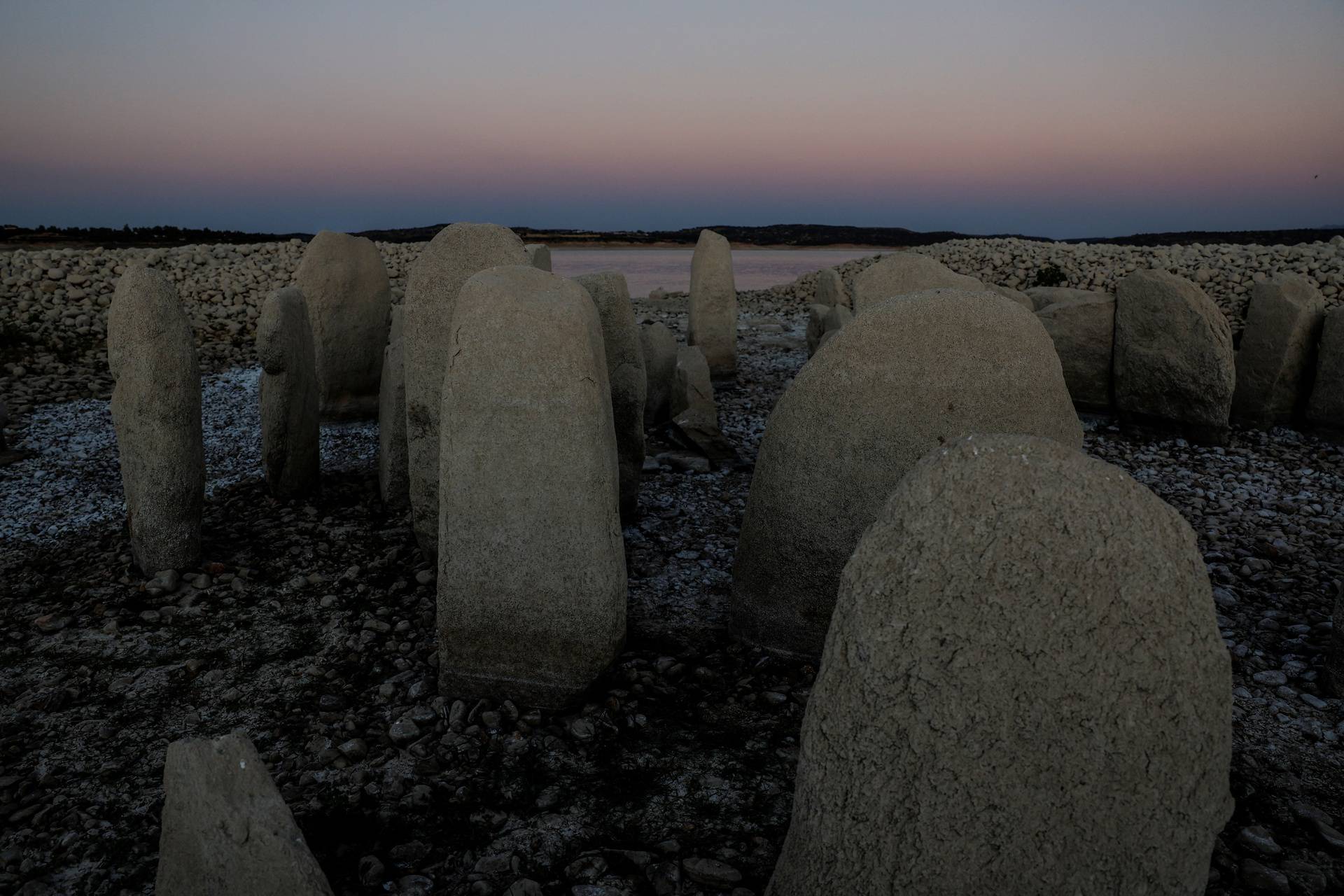 The dolmen of Guadalperal, also known as the Spanish Stonehenge, is seen due to the receding waters of the Valdecanas reservoir in the outskirts of El Gordo