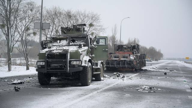 A view shows destroyed military vehicles on a road in Kharkiv