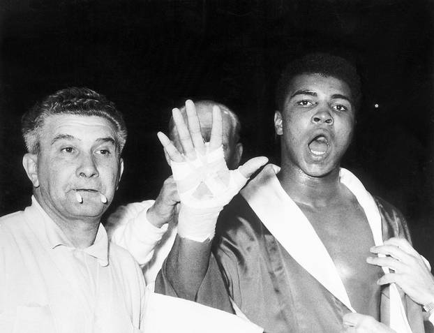  Cassius Clay (later Muhammad Ali) predicts that he will in the fifth round before his fight with Henry Cooper at Wembley Stadium in London