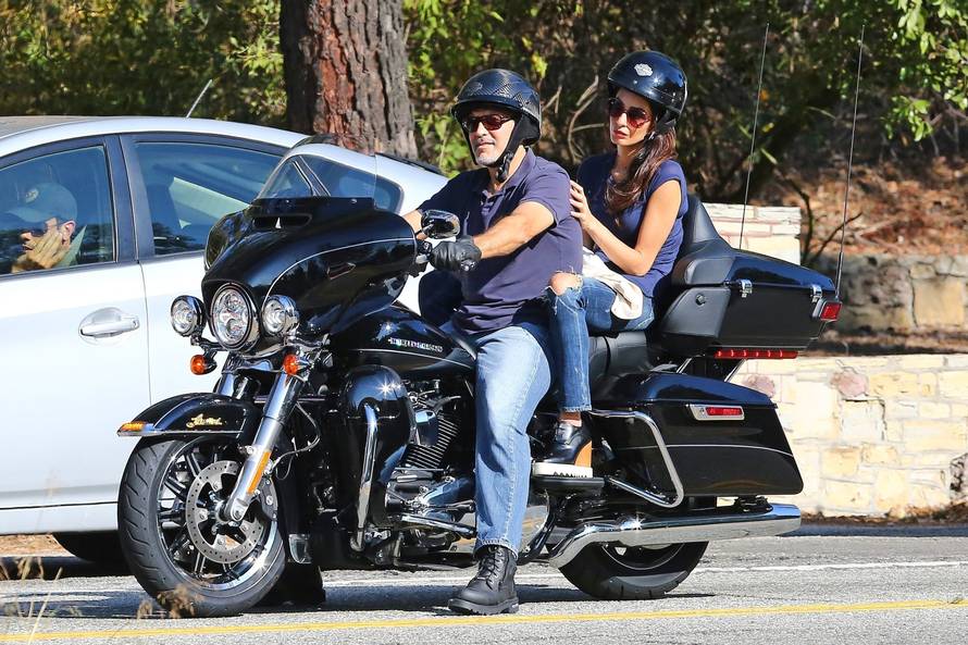 *PREMIUM-EXCLUSIVE* George Clooney to donate his Harley after he was hospitalized following a scooter crash in Italy this past July. **FILE PHOTOS**