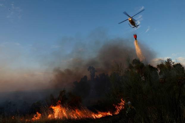 A wildfire burns on the outskirts of Valmojado