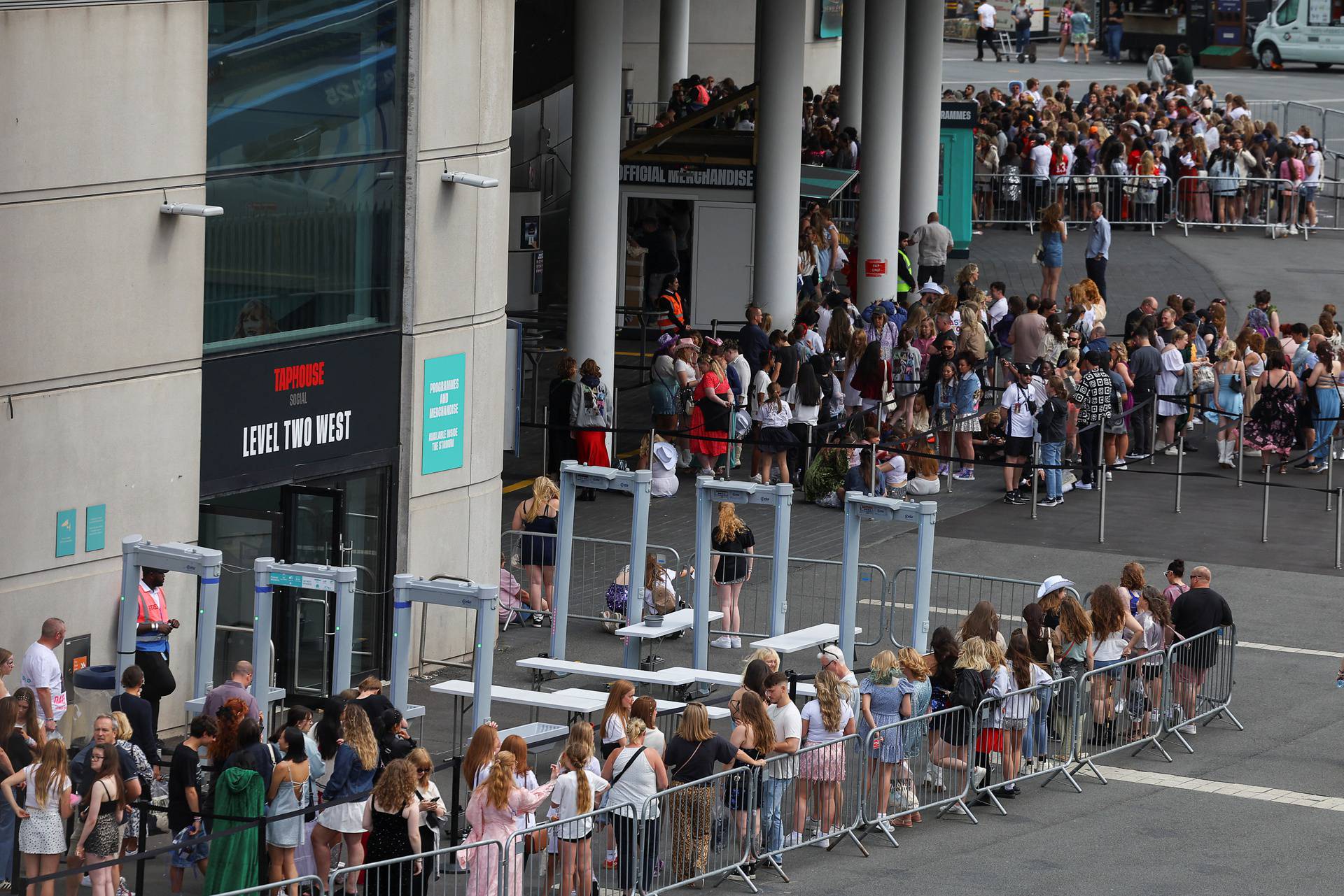 Fans gather for Taylor Swift's concert at Wembley Stadium, in London