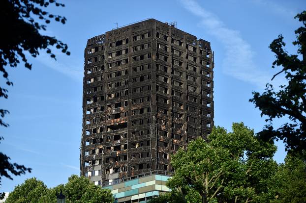 Extensive damage is seen to the Grenfell Tower block which was destroyed in a disastrous fire, in north Kensington, West London