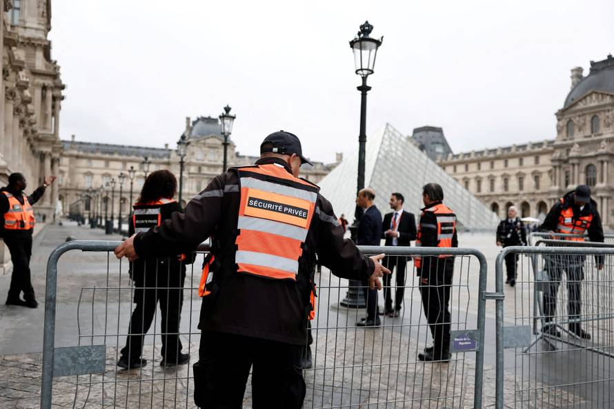FILE PHOTO: The Louvre Museum remains closed on day after robbery