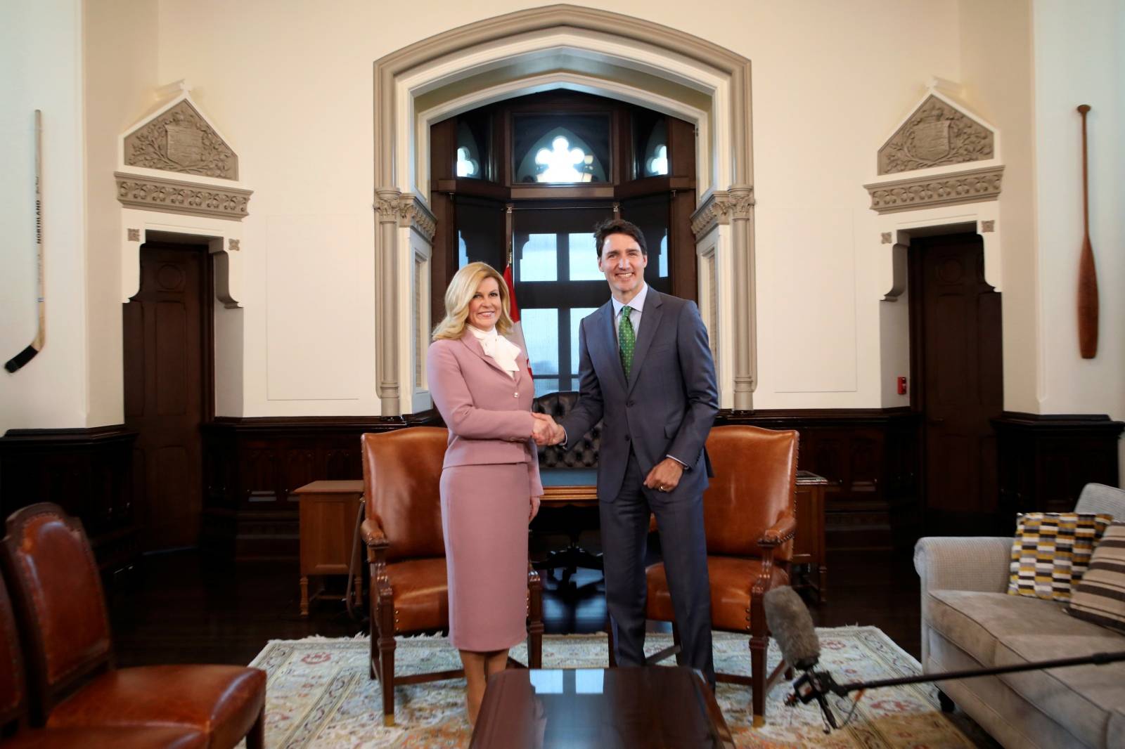 Canada's PM Trudeau shakes hands with Croatia's President Grabar-Kitarovic on Parliament Hill in Ottawa