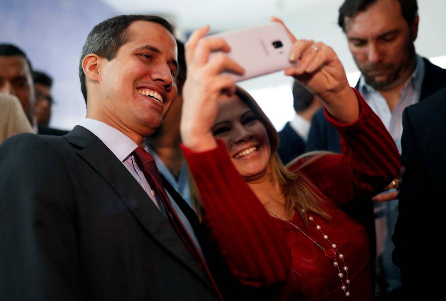Venezuelan opposition leader Juan Guaido attends a meeting with representatives of FEDEAGRO in Caracas