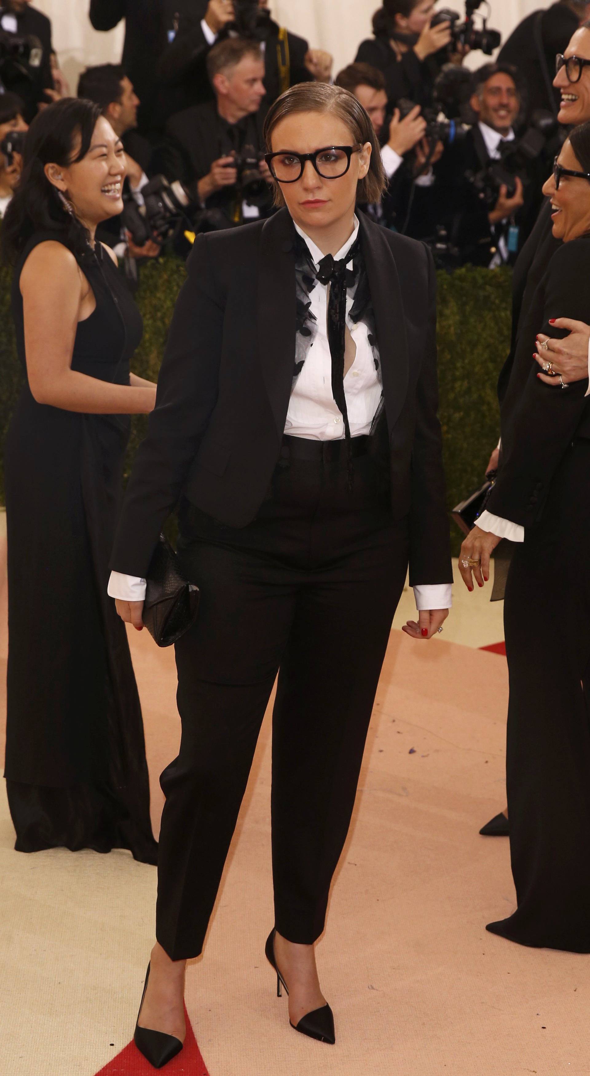 Actress Lena Dunham arrives at the Met Gala in New York