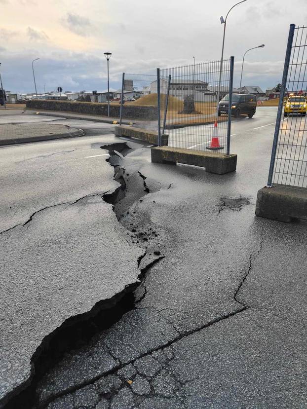 Cracks emerge on a road due to volcanic activity in Grindavik