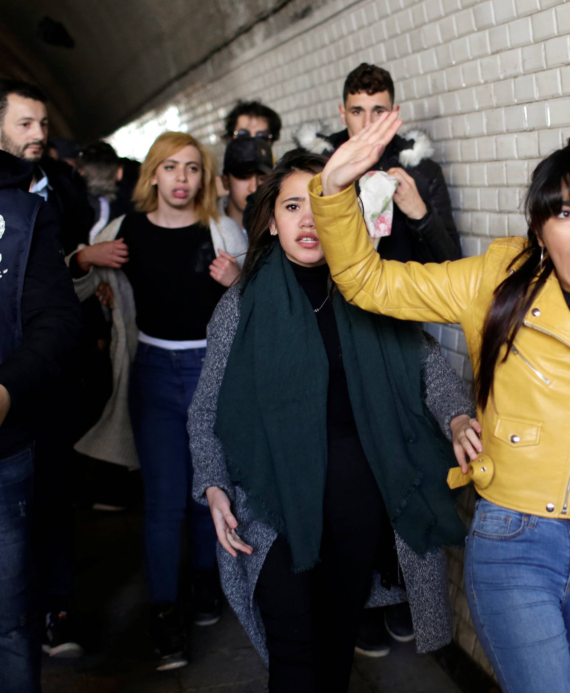 Police try to disperse students protesting against President Abdelaziz Bouteflika's plan to extend his 20-year rule by seeking a fifth term in Algiers