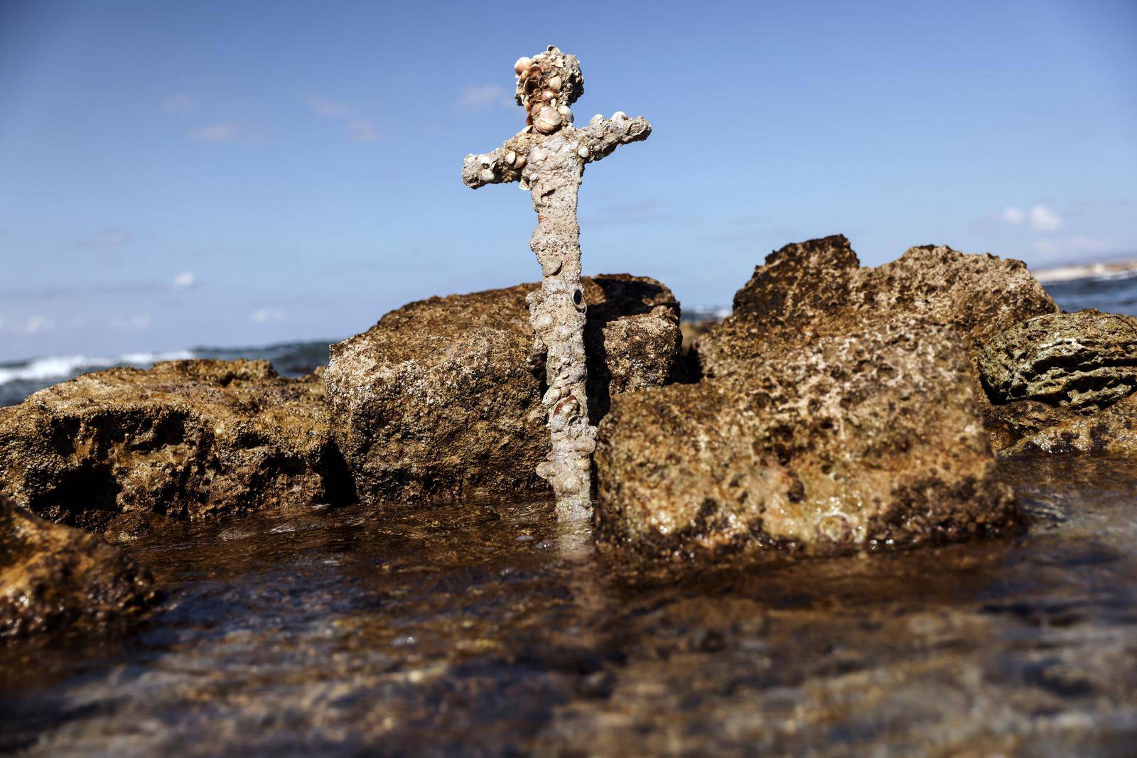 A sword believed to have belonged to a Crusader who sailed to the Holy Land almost a millennium ago was found in Caesarea