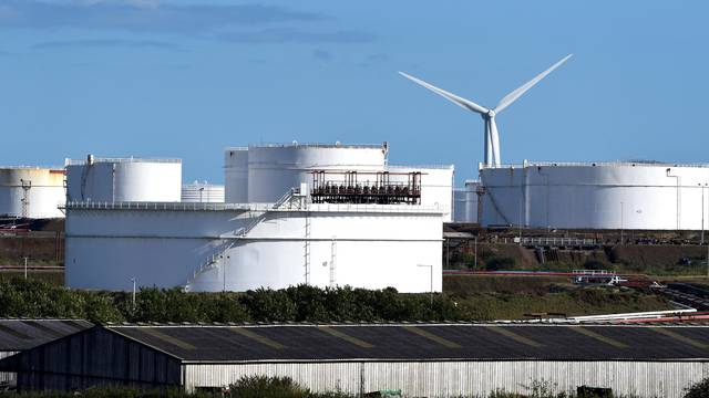 FILE PHOTO: Storage tanks at the Dragon Liquefied Natural Gas (LNG) facility at Waterston, Milford Haven, Pembrokeshire, Wales