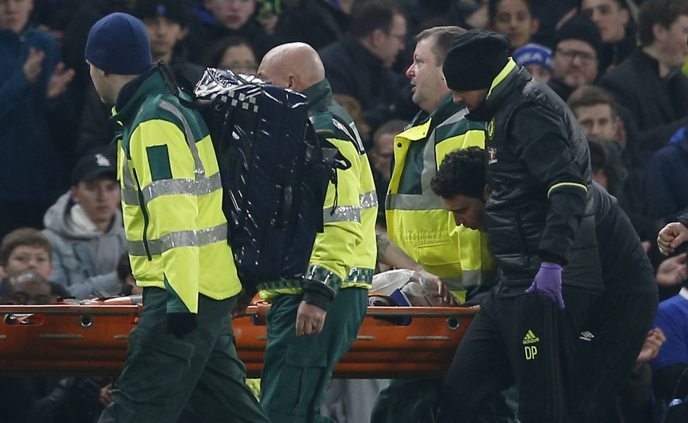 Hull City's Ryan Mason is stretchered off injured