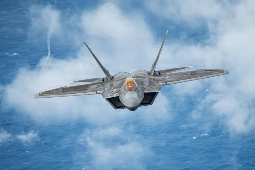 A U.S. Air Force F-22 Raptor assigned to the 154th Wing, Hawaii Air National Guard, takes part in a multi-ship formation off the coast of Hawaii, Jan. 5, 2026. The aircraft participated in a comprehensive training sortie designed to integrate the 154th Op