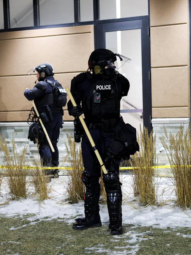 Protest outside the hotel where Bovino, who has been removed from his role, is reportedly staying, in Maple Grove
