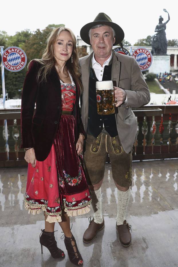 Ancelotti, head coach of FC Bayern Munich and his wife Mariann Barrena McClay pose during their visit at the Oktoberfest in Munich