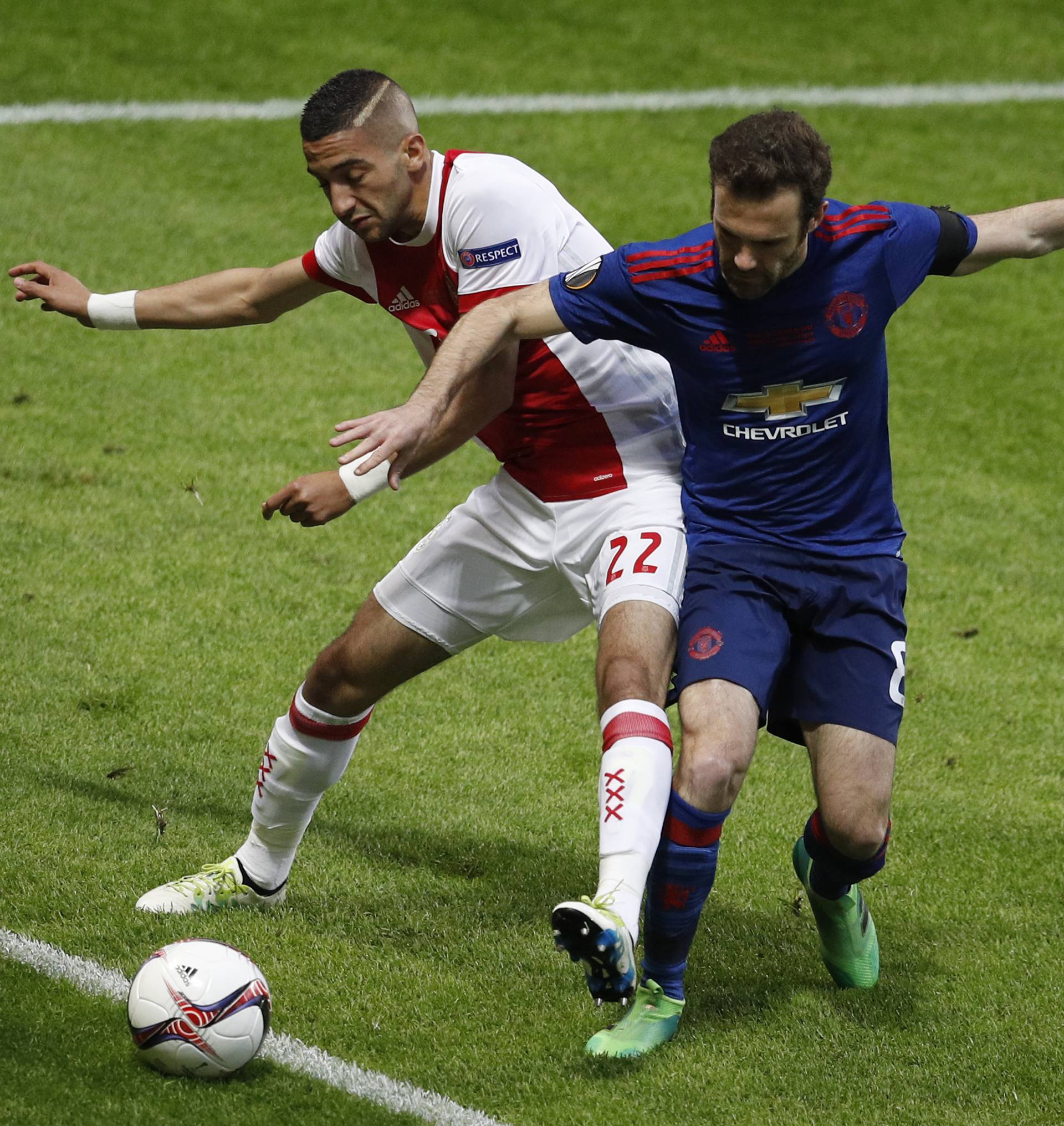 Ajax's Hakim Ziyech in action with Manchester United's Juan Mata