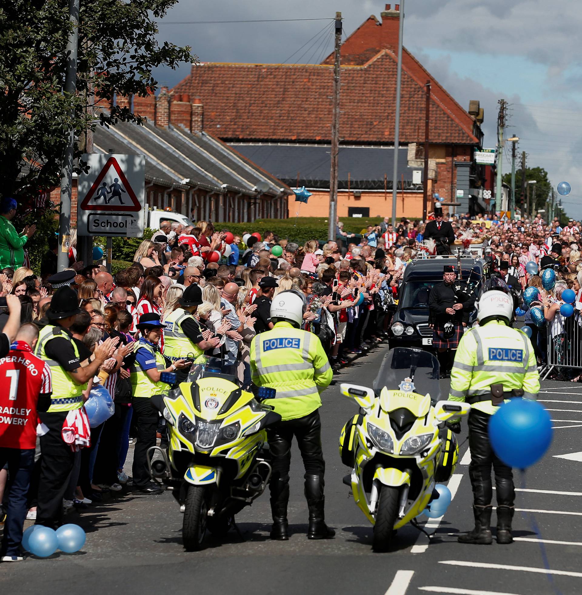 Football fans and wellwishers gather ahead of the funeral of Bradley Lowery