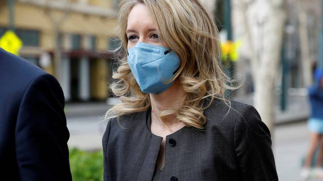 FILE PHOTO: Theranos founder Elizabeth Holmes  and her family leave the federal courthouse after attending her fraud trial in San Jose