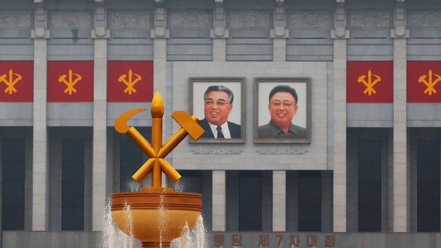 Pictures of former North Korean leaders Kim Il Sung and Kim Jong Il decorate April 25 House of Culture, the venue of Workers' Party of Korea (WPK) congress in Pyongyang