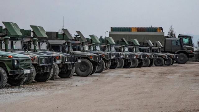 Army trucks are parked after arrival of new EUFOR troops in Sarajevo