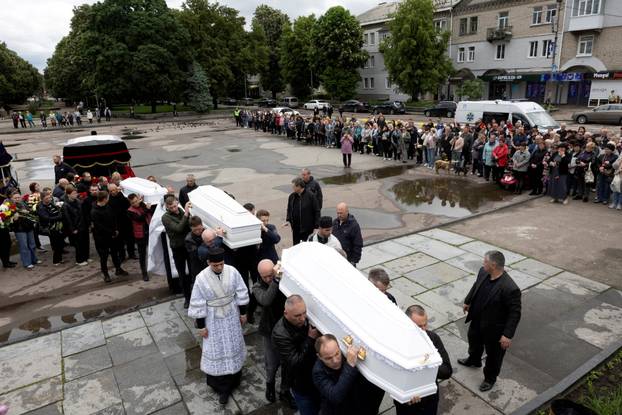 Funeral of the Tamara, Stanislav and Roman Martyniuk who were killed in a Russian missile strike in Korostyshiv