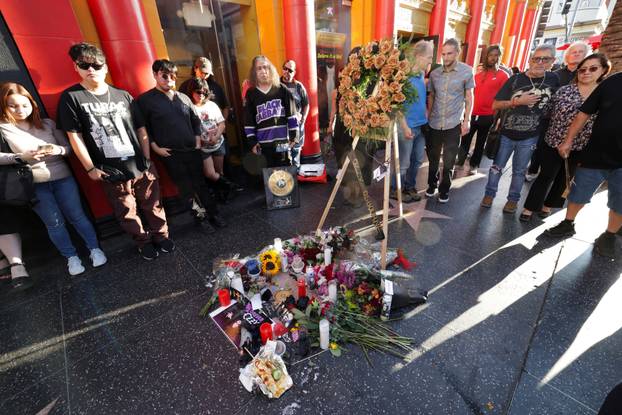 Flowers and pictures are placed on the star of late Ozzy Osbourne at the Hollywood Walk of Fame in Los Angeles