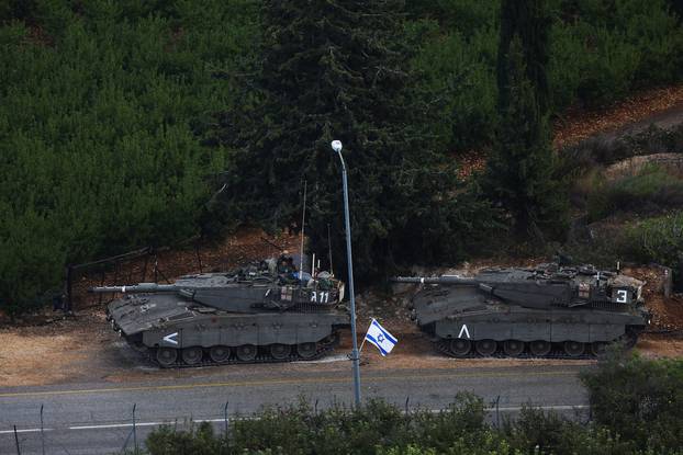 Israeli tanks are seen near Israel's border with Lebanon, as tension mounts between the two countries, in northern Israel