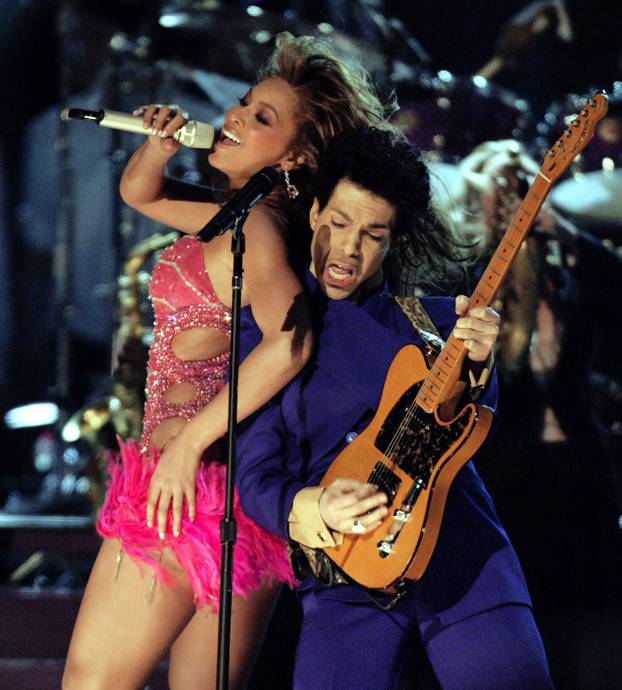 Singers Prince and Beyonce perform during the 46th annual Grammy Awards in Los Angeles