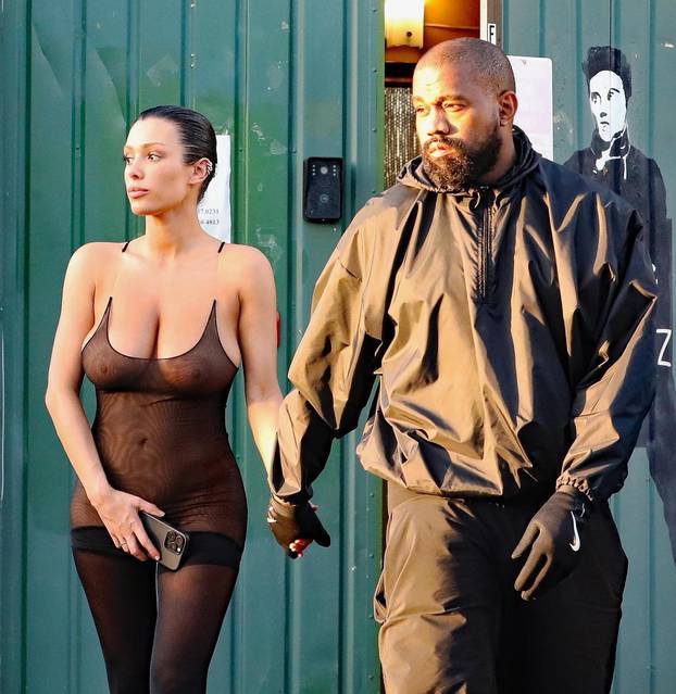 *PREMIUM-EXCLUSIVE* Kanye West and wife Bianca Censori turns heads as she wears shocking fully sheer tights to tanning salon