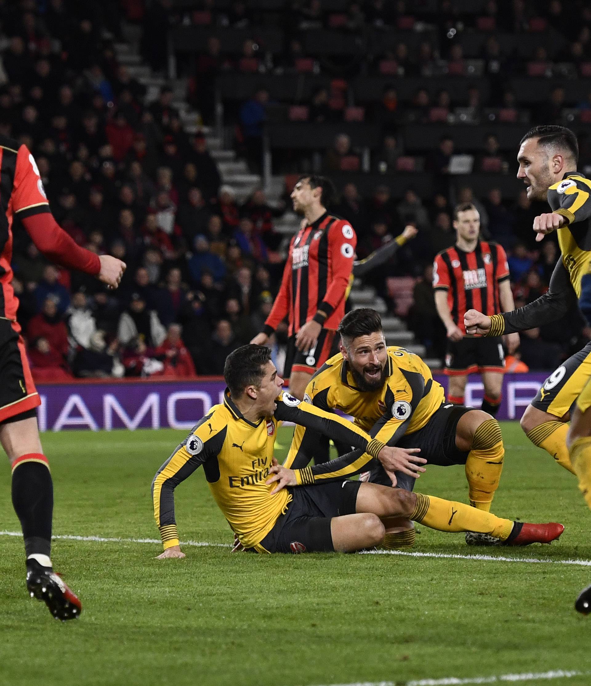 Arsenal's Olivier Giroud celebrates scoring their third goal