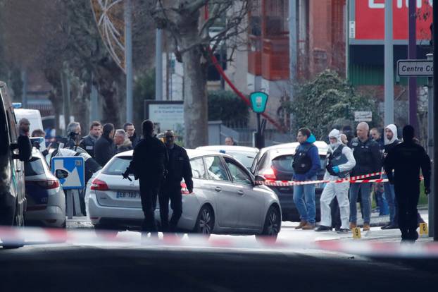 French police secure an area after a knife attack in a public park in Villejuif