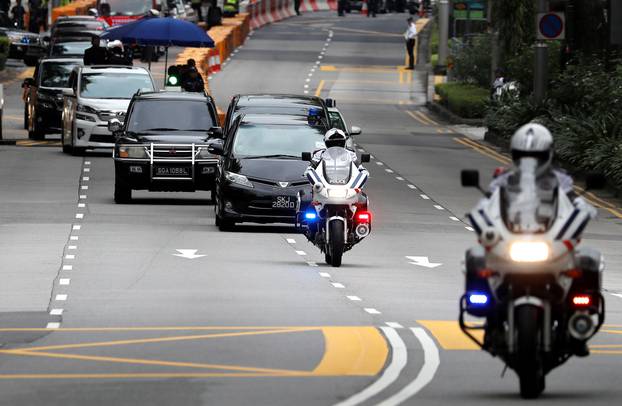 The motorcade of North Korean leader Kim Jong Un travels towards Sentosa for his meeting with U.S. President Donald Trump, in Singapore