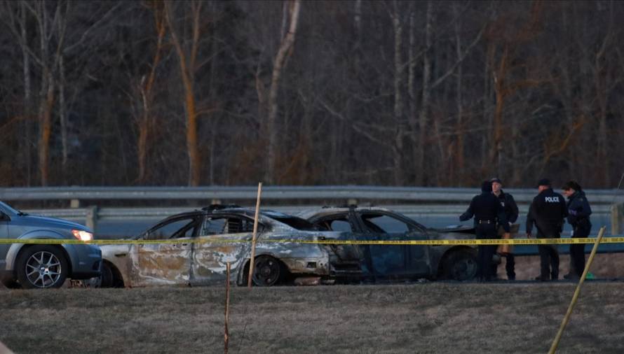RCMP officers fake RCMP car collision scene by Gabriel Wortman