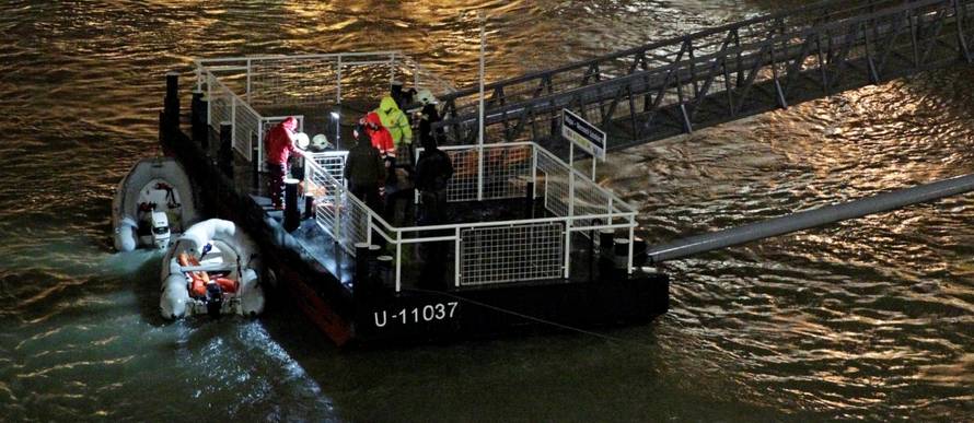 A rescue boat is seen on the Danube river after a tourist boat capsized in Budapest