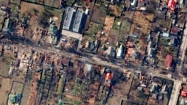A satellite image shows an overview of Yablonska Street, in Bucha